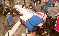Mecanics work on Martin Donnelly's A11 at the 1989 French GP